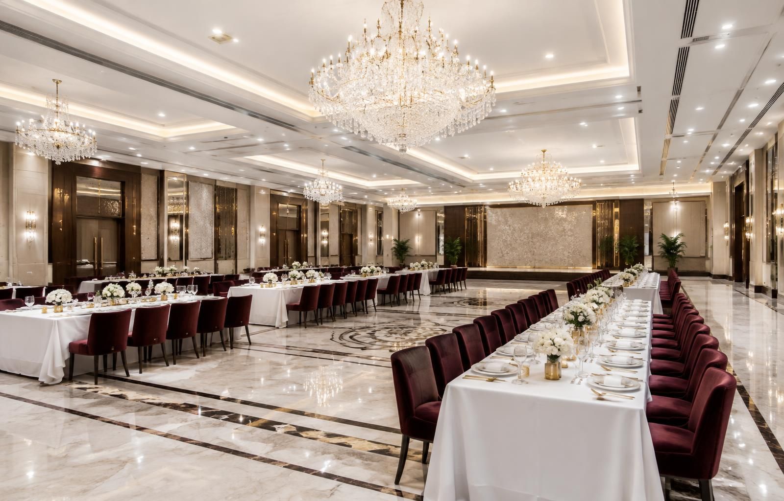 Illustrative banquet hall with long dinner tables and chandeliers